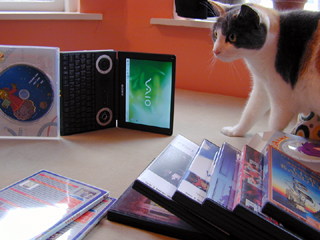 Mishka, the U101, and a pile of DVDs.